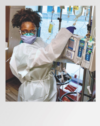 Nurse wearing PPE.